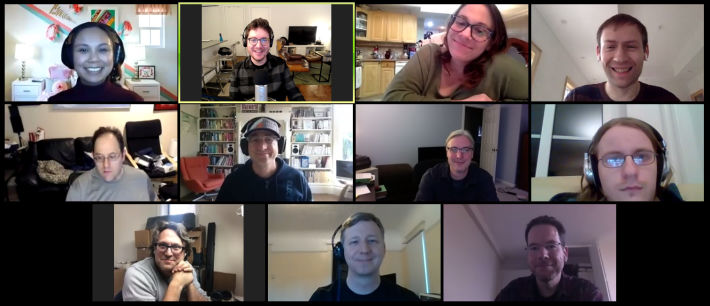 Screenshot of the Zoom video conferencing app with 11 faces smiling at the camera.